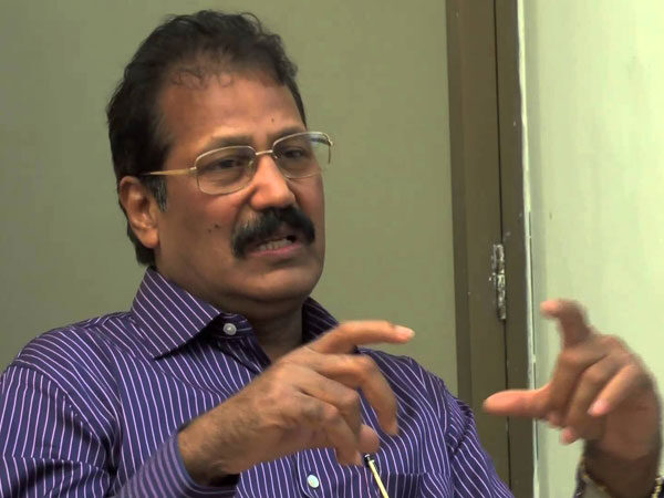 Dr Krishnasamy